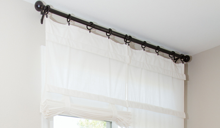 Tumble shades in Fort Lauderdale give your doors privacy versatility and style. White tumble shade on double glass doors